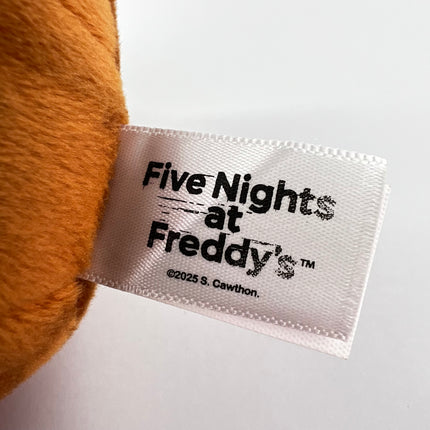 Jazwares Five Nights At Freddy's (FNAF) Toy Freddy, 8 inch Plush Wave 2 Glow-in-the-Dark Eyes: Orphan
